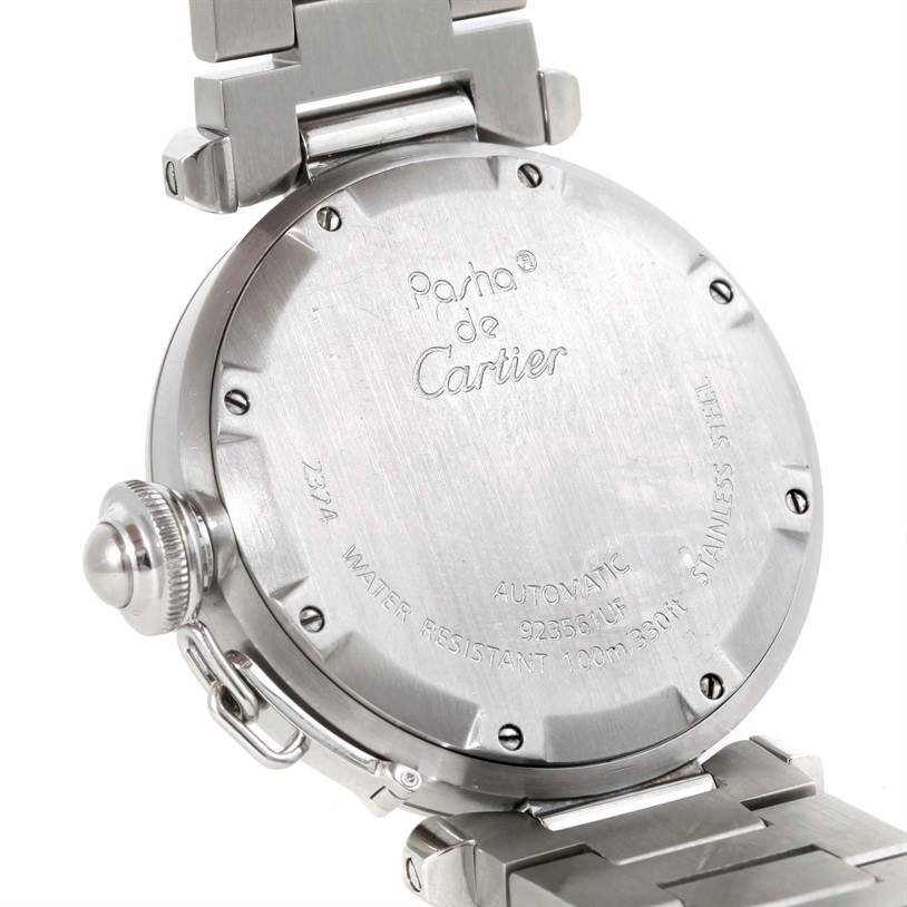 This image shows the back case of a Cartier Pasha W31076M7 Women's Stainless Steel Black Dial W31076M7 Women's Stainless Steel Black Dial watch, highlighting its engravings and clasp attachment.