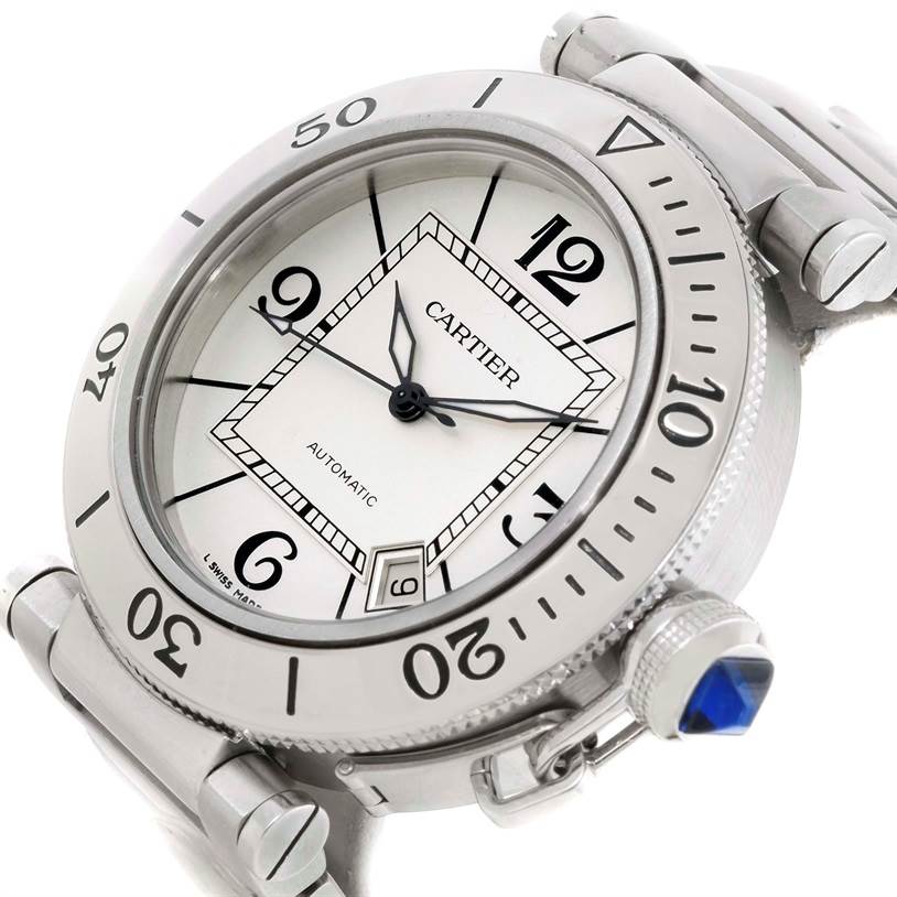 The image shows a close-up angle of a Cartier Pasha W31080M7 Men
s Stainless Steel Silver Dial W31080M7 Men
s Stainless Steel Silver Dial watch face and part of the strap, including the bezel, crown, and dial.