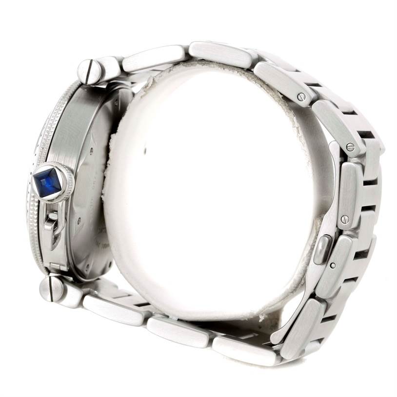 This image shows a side view of a Cartier Pasha W31080M7 Men
s Stainless Steel Silver Dial W31080M7 Men
s Stainless Steel Silver Dial watch focusing on the crown and bracelet links.