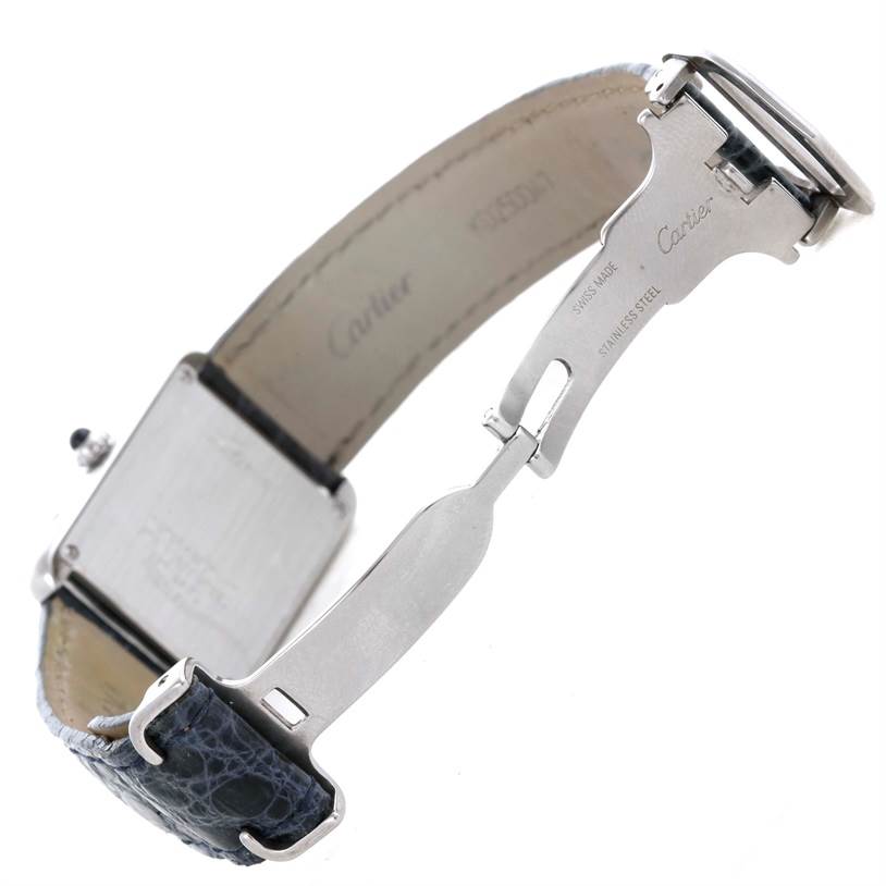 This image shows the open clasp, strap, and part of the back case of a Cartier Tank Solo W1018255 Women's Stainless Steel Silver Dial W1018255 Women's Stainless Steel Silver Dial watch.