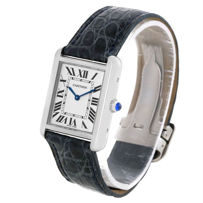 The image shows a Cartier Tank Solo W1018255 Women's Stainless Steel Silver Dial W1018255 Women's Stainless Steel Silver Dial watch at an angle, highlighting its rectangular face, Roman numerals, blue hands, and leather strap.