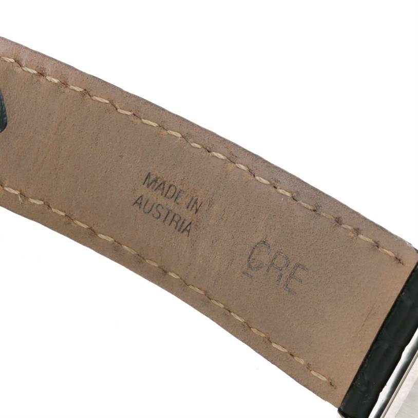 The image shows the underside of the strap of a Cartier Tank Solo W1018255 Women's Stainless Steel Silver Dial W1018255 Women's Stainless Steel Silver Dial watch, displaying "Made in Austria" and part of the buckle.