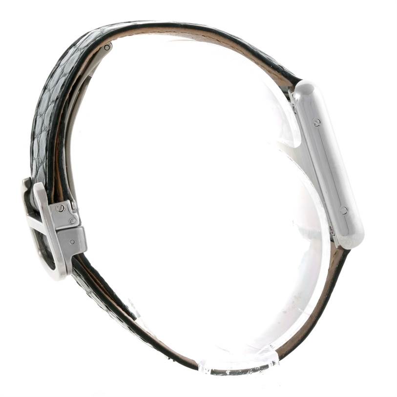 The Cartier Tank Solo W1018255 Women's Stainless Steel Silver Dial W1018255 Women's Stainless Steel Silver Dial watch is shown from a side angle highlighting the leather strap and side of the watch case.