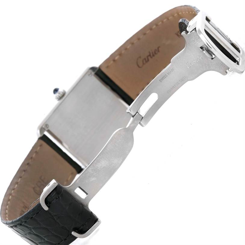The image shows the open clasp, leather strap, and back case of a Cartier Tank Solo W1018255 Women's Stainless Steel Silver Dial W1018255 Women's Stainless Steel Silver Dial watch, viewed from an angle focusing on the inner parts.