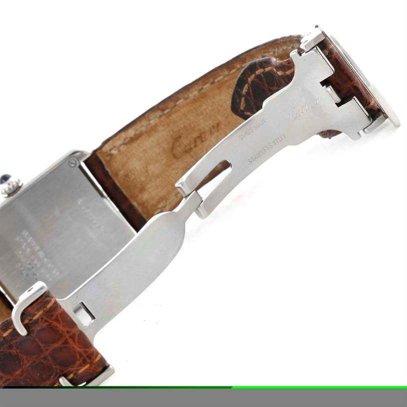 The image shows the open clasp and brown leather strap of a Cartier Tank Solo W1018255 Women's Stainless Steel Silver Dial W1018255 Women's Stainless Steel Silver Dial watch.