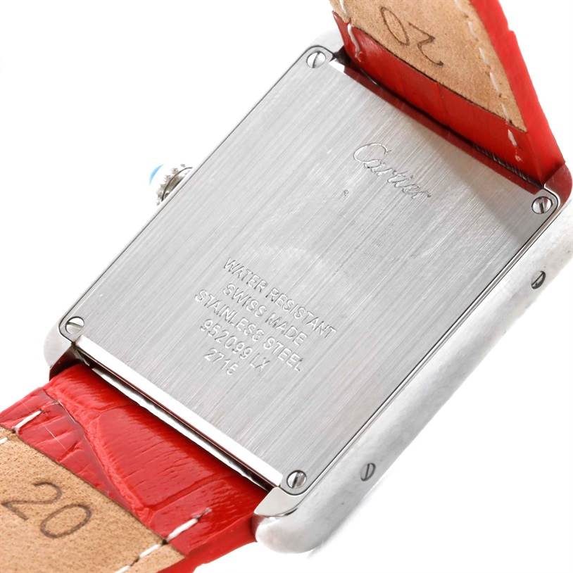 This image shows the back case and part of the red leather strap of the Cartier Tank Solo W1018355 Women's Stainless Steel Silver Dial W1018355 Women's Stainless Steel Silver Dial watch at an oblique angle.