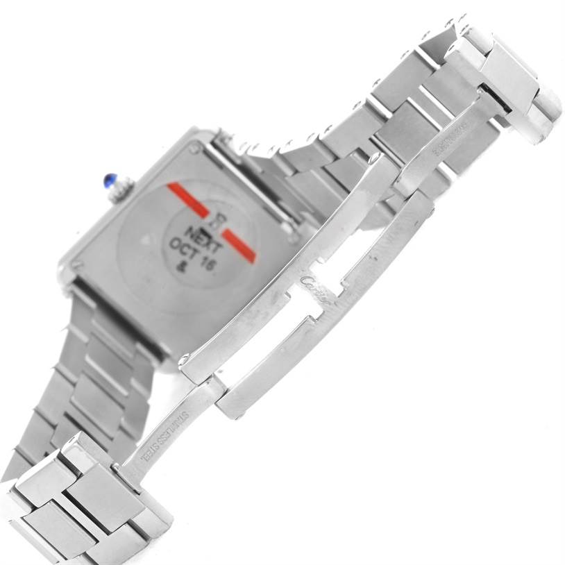 The image shows the back and clasp mechanism of a Cartier Tank Solo W5200013 Women
s Stainless Steel Silver Dial W5200013 Women
s Stainless Steel Silver Dial watch, highlighting its stainless steel bracelet.