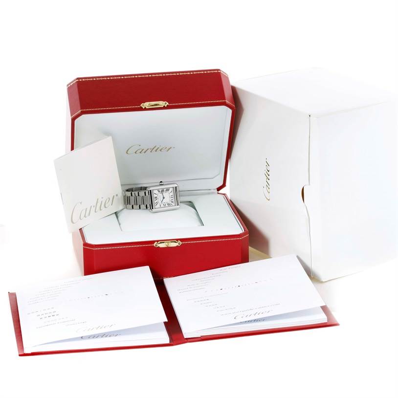 The image shows a Cartier Tank Solo W5200013 Women
s Stainless Steel Silver Dial W5200013 Women
s Stainless Steel Silver Dial watch, its box, paperwork, and an outer white box, all laid out for display.