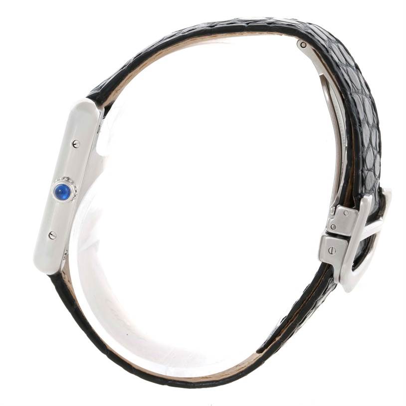The image shows a side view of the Tank Solo model watch by Cartier, highlighting the crown, case, and clasp mechanism.