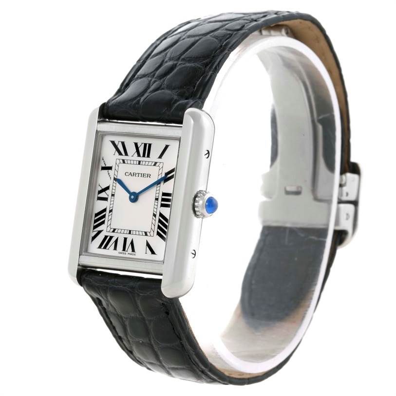This image shows a Cartier Tank Solo W1018255 Women's Stainless Steel Silver Dial W1018255 Women's Stainless Steel Silver Dial watch from a three-quarter angle, highlighting its face, crown, and leather strap.
