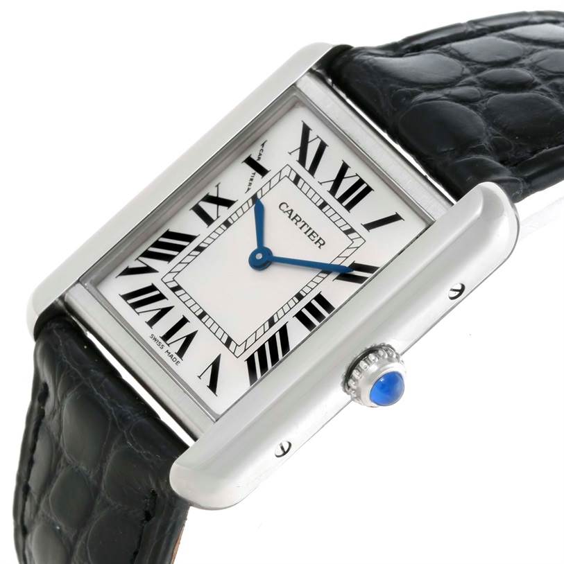 This image shows a Cartier Tank Solo W1018255 Women's Stainless Steel Silver Dial W1018255 Women's Stainless Steel Silver Dial watch angled to display the face, blue hands, Roman numerals, crown, and black leather strap.