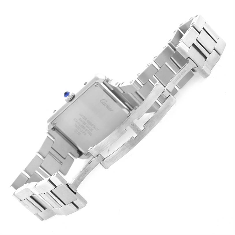 The image shows the back view of a Cartier Tank Solo W5200013 Women
s Stainless Steel Silver Dial W5200013 Women
s Stainless Steel Silver Dial model watch, highlighting its bracelet and clasp.