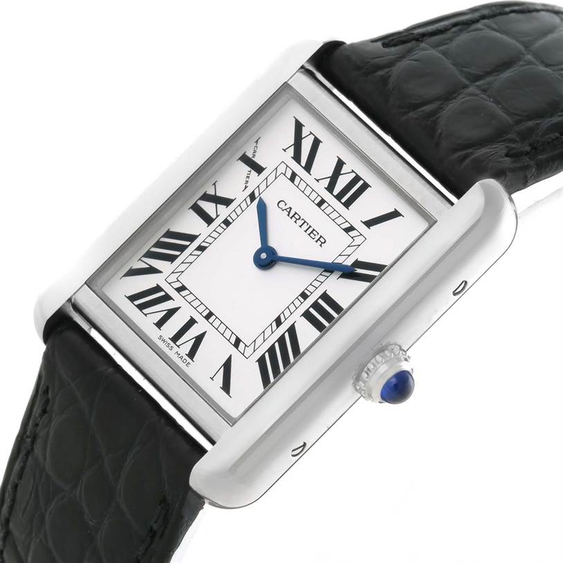 The image shows a close-up angled view of the Cartier Tank Solo W1018255 Women
s Stainless Steel Silver Dial W1018255 Women
s Stainless Steel Silver Dial watch, highlighting its face, case, crown, and part of the leather strap.