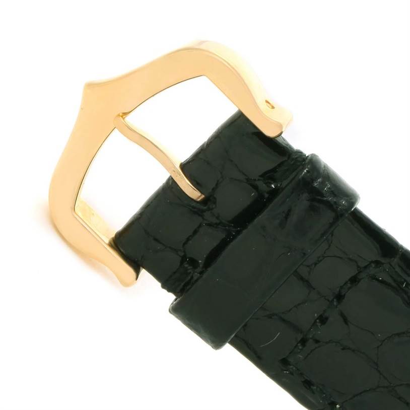 This image shows a close-up of the buckle and leather strap of a Cartier Tank Solo W1018755 Women's Steel and Gold (two tone) Silver Dial W1018755 Women's Steel and Gold (two tone) Silver Dial watch.