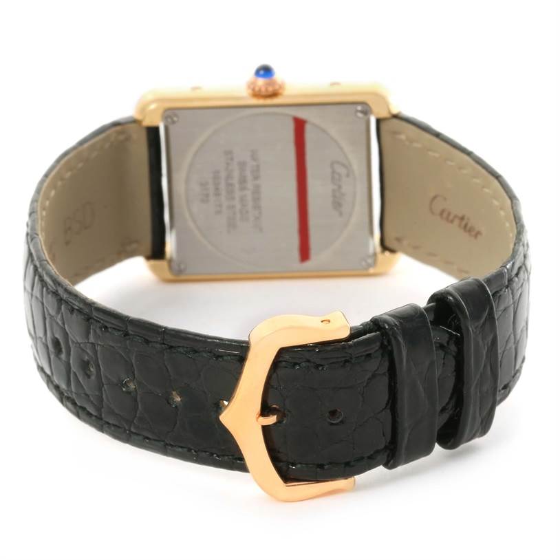 The image shows the back view of a Cartier Tank Solo W1018755 Women's Steel and Gold (two tone) Silver Dial W1018755 Women's Steel and Gold (two tone) Silver Dial watch, highlighting the case back, strap, and buckle details.