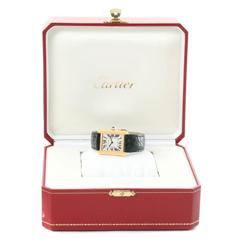 The Cartier Tank Solo W1018755 Women's Steel and Gold (two tone) Silver Dial W1018755 Women's Steel and Gold (two tone) Silver Dial watch is displayed frontally inside its open red and white box.