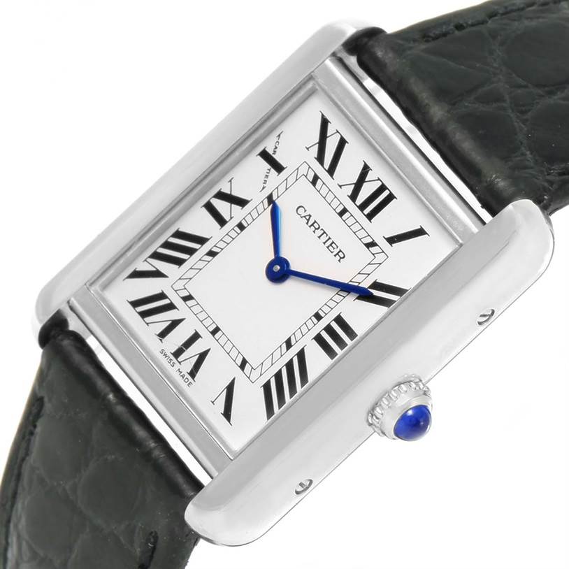 The image shows a front angle close-up of a Cartier Tank Solo W1018255 Women
s Stainless Steel Silver Dial W1018255 Women
s Stainless Steel Silver Dial watch, highlighting its face, Roman numerals, and leather strap.