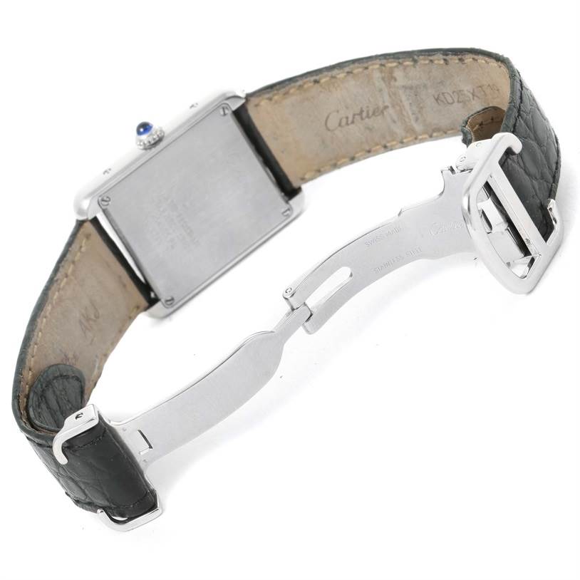 The image shows the backside, clasp, and leather strap of a Tank Solo watch by Cartier.