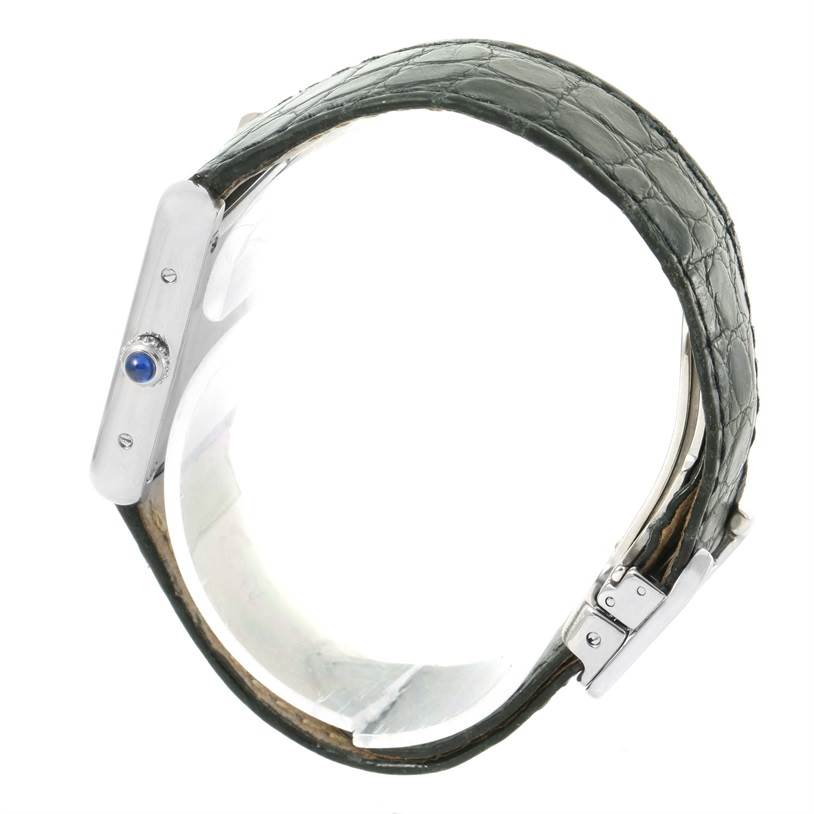 The image shows a side view of the Cartier Tank Solo W1018255 Women
s Stainless Steel Silver Dial W1018255 Women
s Stainless Steel Silver Dial watch, highlighting its case profile, side crown, and leather strap.