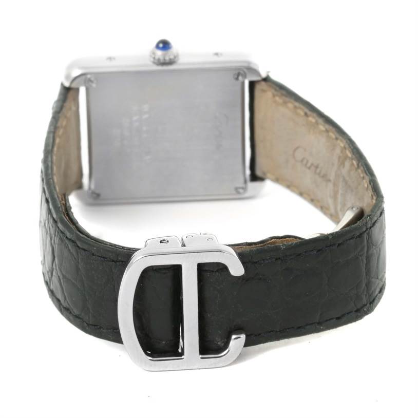 This image shows the back case and leather strap of a Cartier Tank Solo W1018255 Women
s Stainless Steel Silver Dial W1018255 Women
s Stainless Steel Silver Dial watch, including the clasp.