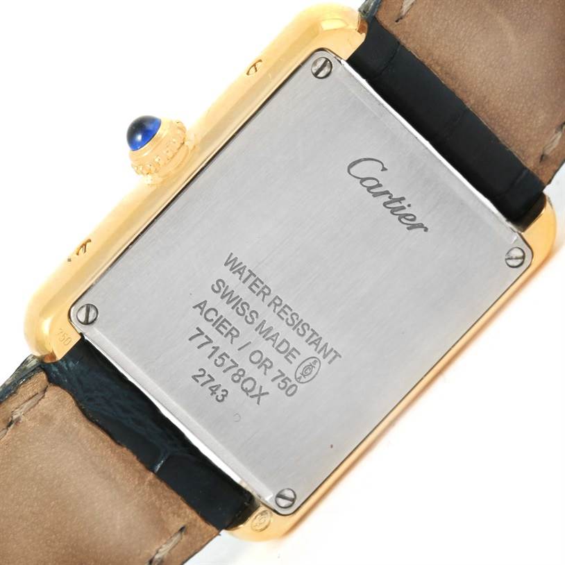 The image shows the back and side of a Cartier Tank Solo W1018755 Women's Steel and Gold (two tone) Silver Dial W1018755 Women's Steel and Gold (two tone) Silver Dial watch, highlighting the case back and leather strap.