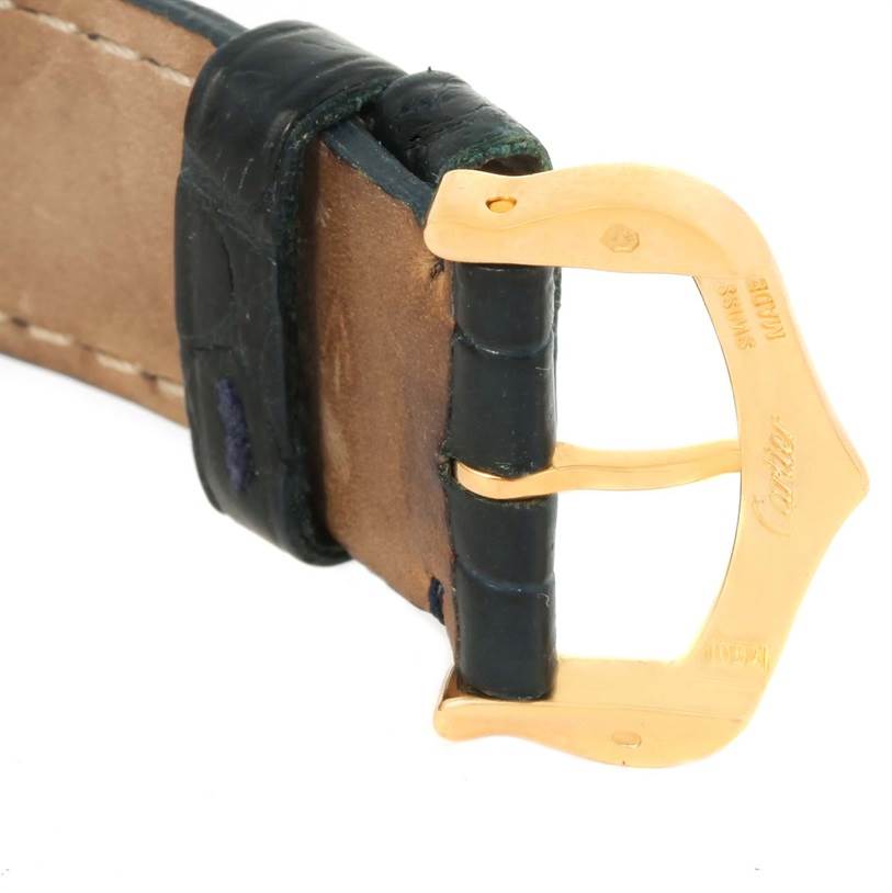 The image shows a close-up of the gold buckle and black leather strap of a Cartier Tank Solo W1018755 Women's Steel and Gold (two tone) Silver Dial W1018755 Women's Steel and Gold (two tone) Silver Dial watch.