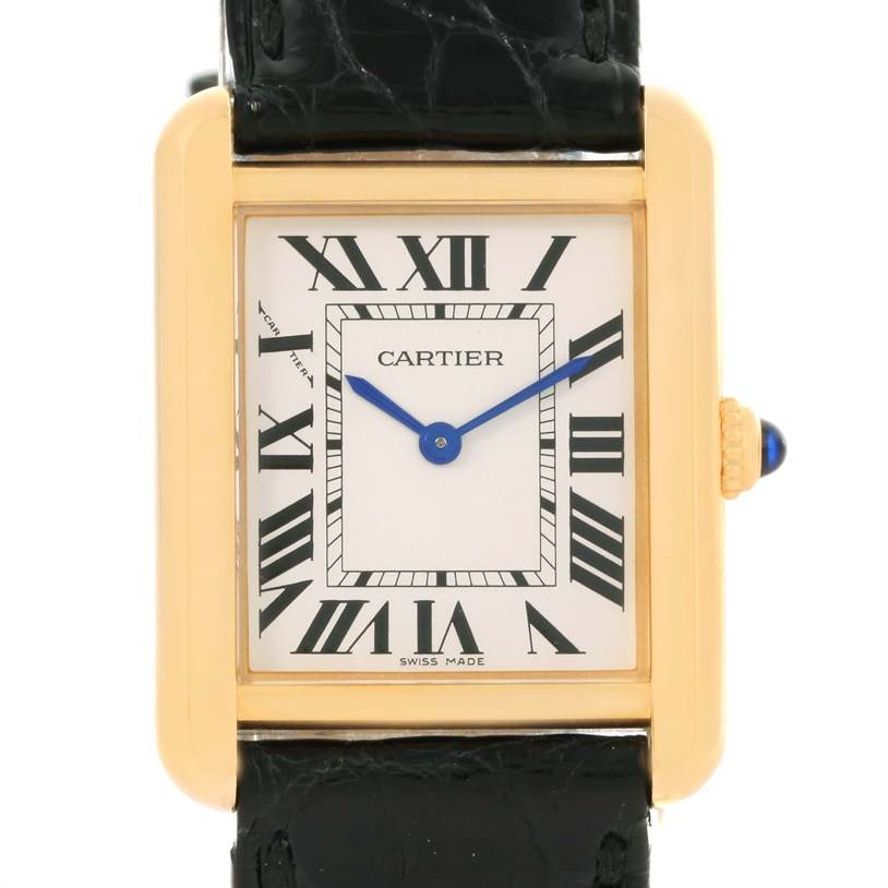 The image shows a front view of the Cartier Tank Solo W1018755 Women's Steel and Gold (two tone) Silver Dial W1018755 Women's Steel and Gold (two tone) Silver Dial watch, highlighting its rectangular dial, Roman numerals, and black strap.