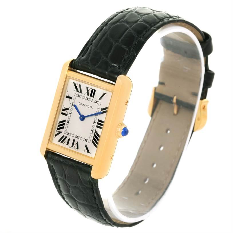 The image shows a Cartier Tank Solo W1018755 Women's Steel and Gold (two tone) Silver Dial W1018755 Women's Steel and Gold (two tone) Silver Dial watch from an angled view, highlighting the face, strap, and crown.