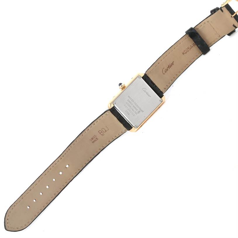 The image shows the back view of the Cartier Tank Solo W1018755 Women's Steel and Gold (two tone) Silver Dial W1018755 Women's Steel and Gold (two tone) Silver Dial watch, displaying its case back, straps, and markings.