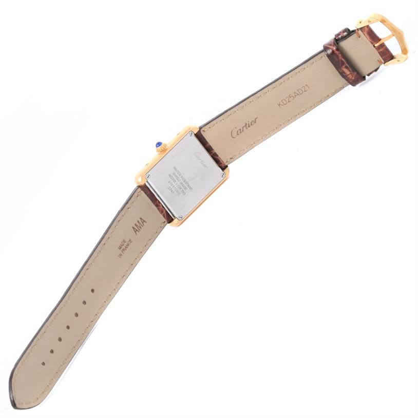 The image shows the back view of a Cartier Tank Solo W1018755 Women's Steel and Gold (two tone) Silver Dial W1018755 Women's Steel and Gold (two tone) Silver Dial watch, displaying its strap, clasp, and caseback.