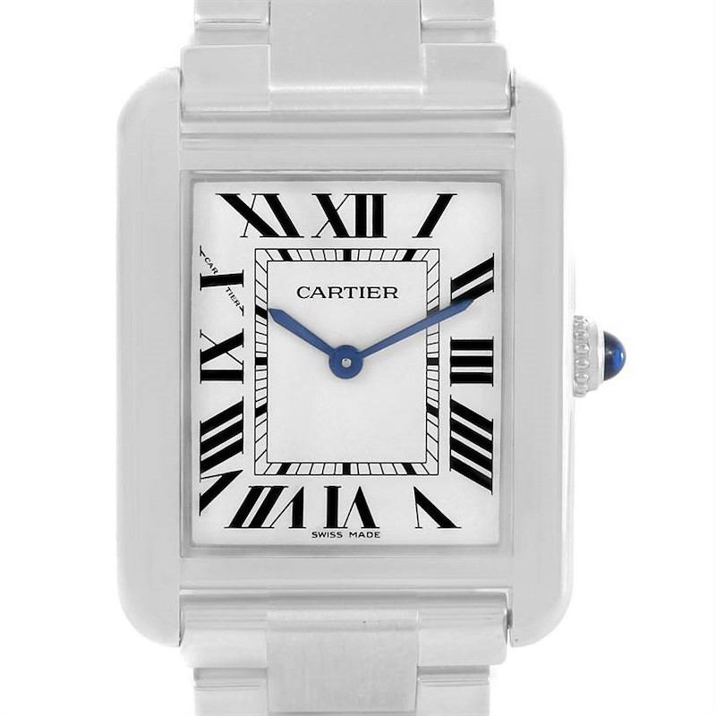 The image shows a frontal view of the Cartier Tank Solo watch, showcasing its rectangular face, Roman numerals, and metallic band.