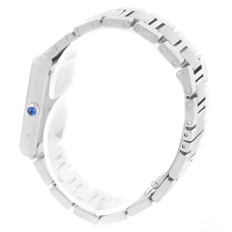The image shows the side profile and bracelet of the Cartier Tank Solo W5200013 Women's Stainless Steel Silver Dial W5200013 Women's Stainless Steel Silver Dial watch, highlighting its crown with a blue cabochon.