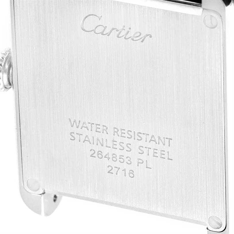 The image shows the back case of a Cartier Tank Solo W1018255 Women
s Stainless Steel Silver Dial W1018255 Women
s Stainless Steel Silver Dial watch, highlighting its water resistance and stainless steel material.