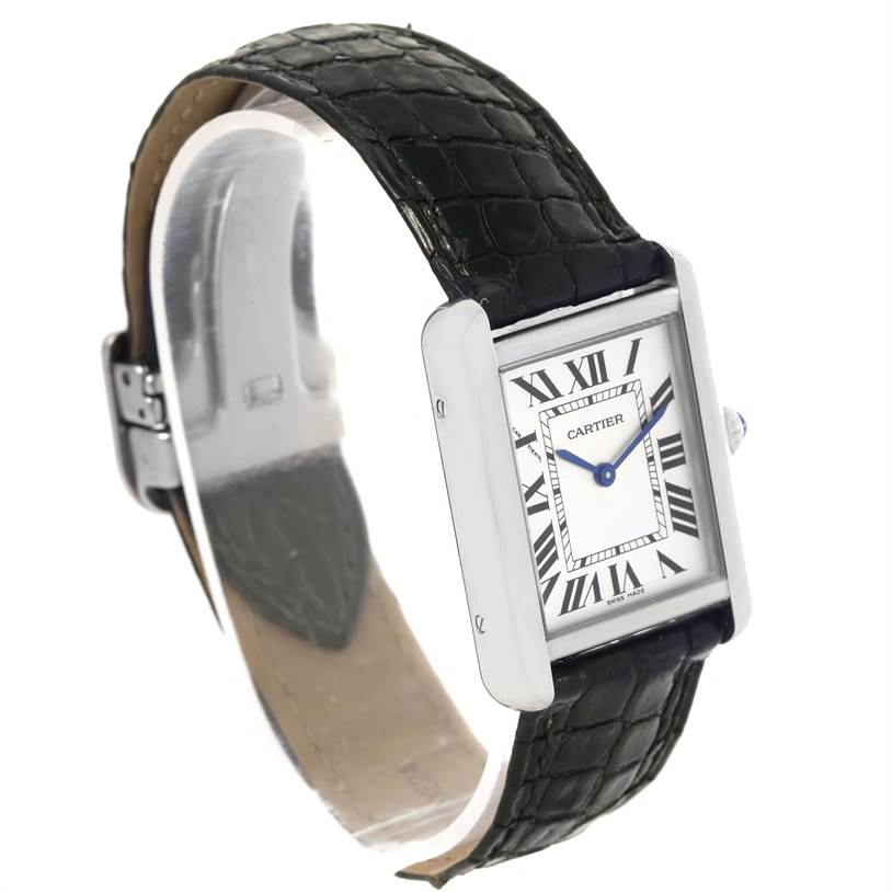The image shows a Cartier Tank Solo W1018255 Women
s Stainless Steel Silver Dial W1018255 Women
s Stainless Steel Silver Dial watch from a side view, displaying its face, strap, and clasp details.