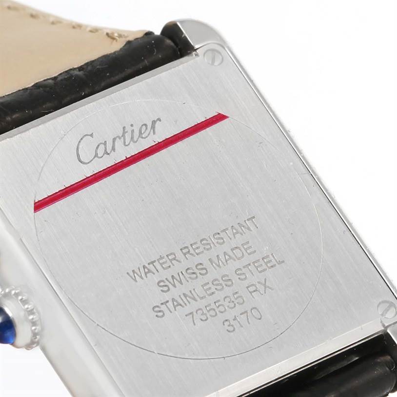 The image shows the back of the Cartier Tank Solo W1018255 Women
s Stainless Steel Silver Dial W1018255 Women
s Stainless Steel Silver Dial watch, displaying the brand name, model details, and strap attachment points.