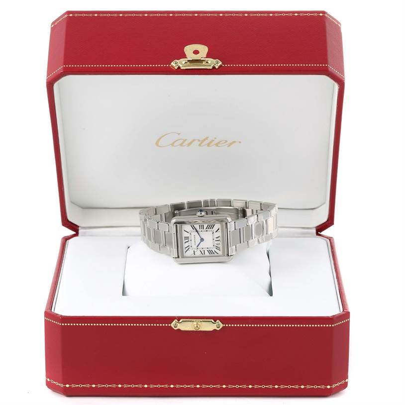 The Cartier Tank Solo W5200013 Women's Stainless Steel Silver Dial W5200013 Women's Stainless Steel Silver Dial watch is shown in a front view, placed in its red and white branded box.