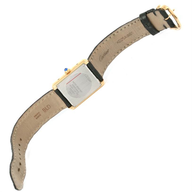 This image shows the back view of a Cartier Tank Solo W1018755 Women's Steel and Gold (two tone) Silver Dial W1018755 Women's Steel and Gold (two tone) Silver Dial watch, highlighting its strap and case back.