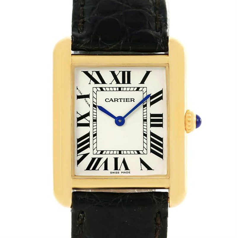 The image shows a Cartier Tank Solo watch from a front view, displaying the face, Roman numerals, blue hands, and part of the black leather strap.