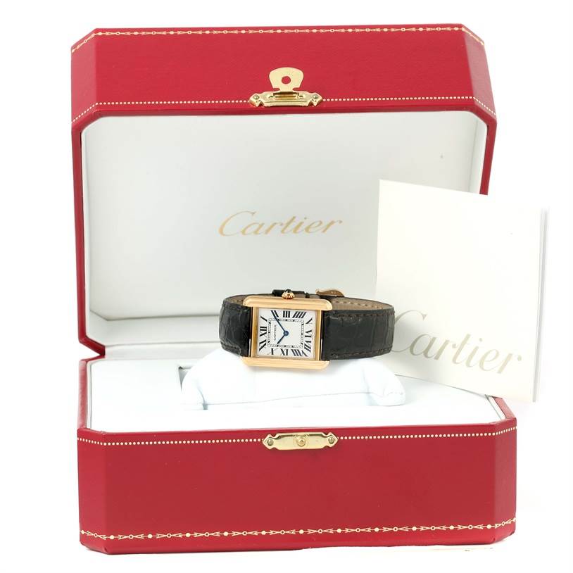 The image shows the Cartier Tank Solo W1018755 Women's Steel and Gold (two tone) Silver Dial W1018755 Women's Steel and Gold (two tone) Silver Dial watch at an angled front view, placed inside an open red Cartier box with accompanying booklet.