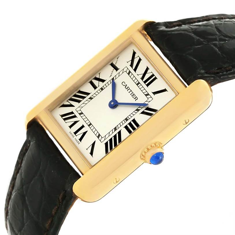 The image shows a Cartier Tank Solo W1018755 Women's Steel and Gold (two tone) Silver Dial W1018755 Women's Steel and Gold (two tone) Silver Dial watch at an angle highlighting the dial, crown, and part of the leather strap.