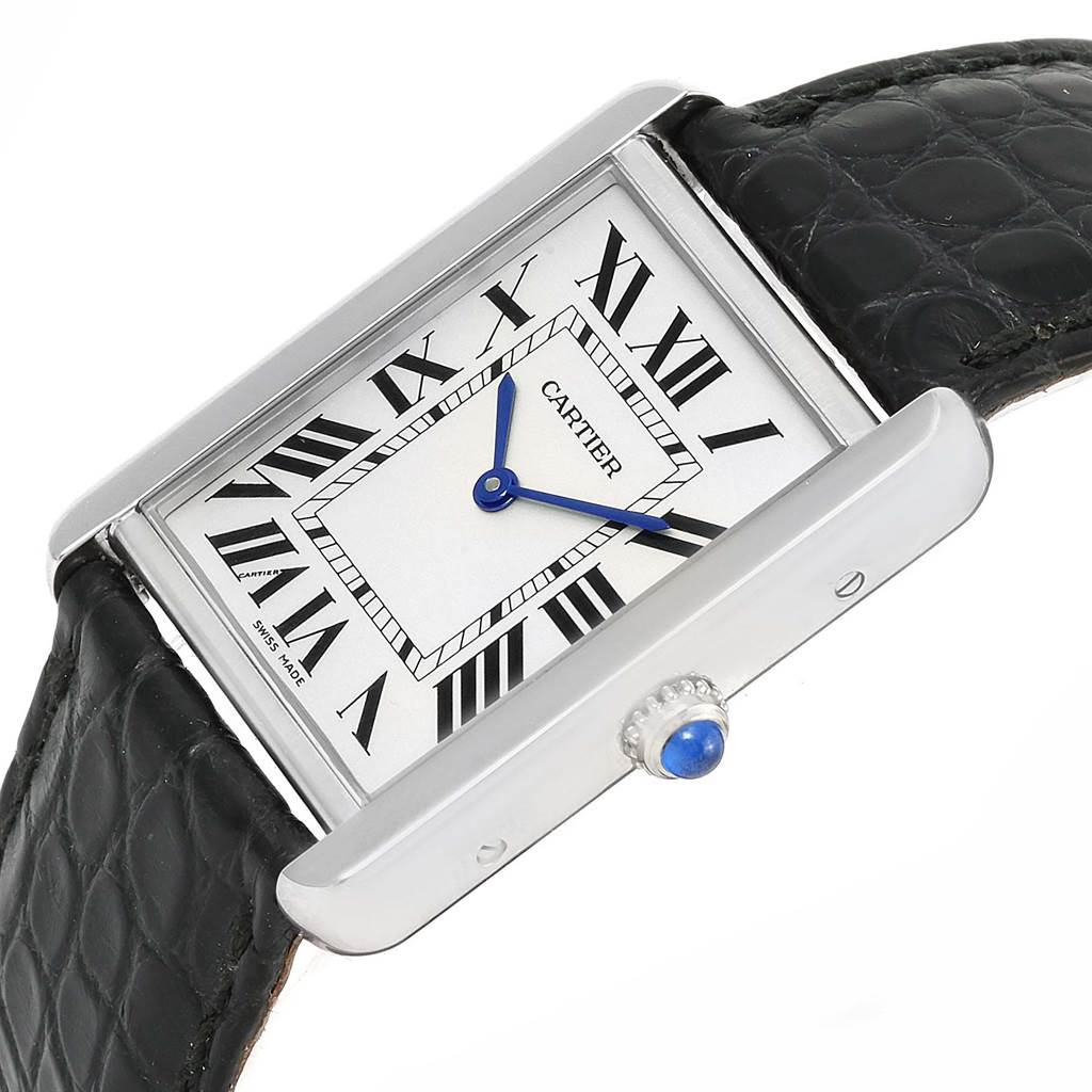 This image shows a Cartier Tank Solo W1018355 Men
s Stainless Steel Silver Dial W1018355 Men
s Stainless Steel Silver Dial watch from a slightly angled side view, highlighting the face, crown, and black leather strap.