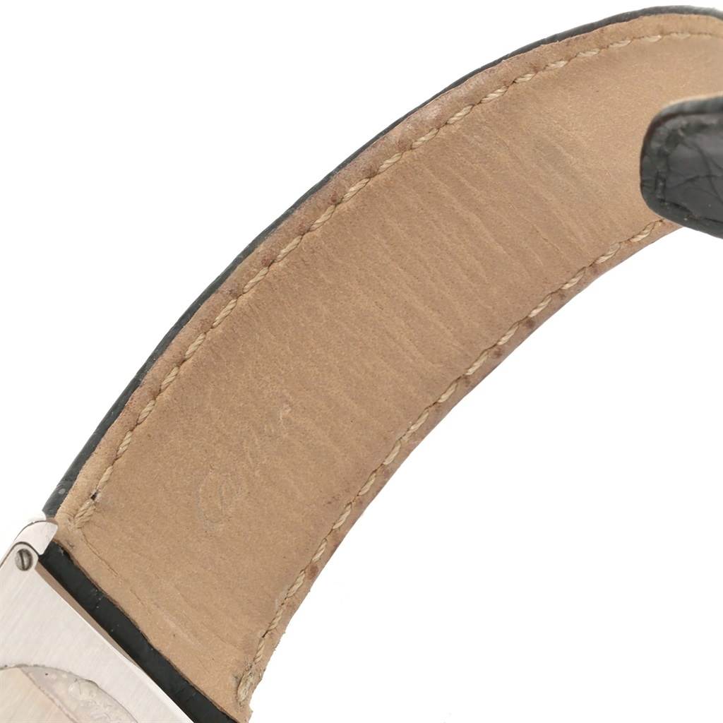 The image shows the underside of the leather strap and a part of the case of the Cartier Tank Solo W1018355 Men
s Stainless Steel Silver Dial W1018355 Men
s Stainless Steel Silver Dial watch.
