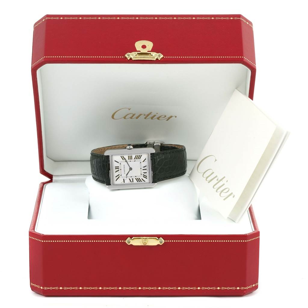 The image shows a Cartier Tank Solo W1018355 Men
s Stainless Steel Silver Dial W1018355 Men
s Stainless Steel Silver Dial watch in its red presentation box with accompanying paperwork.