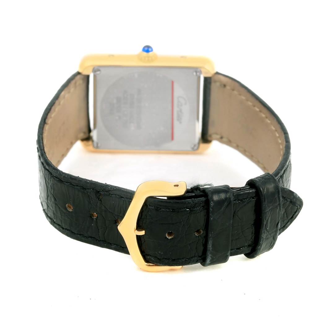 This image shows the Cartier Tank Solo W1018755 Women's Steel and Gold (two tone) Silver Dial W1018755 Women's Steel and Gold (two tone) Silver Dial watch from a rear angle, highlighting the back case, strap, and buckle.