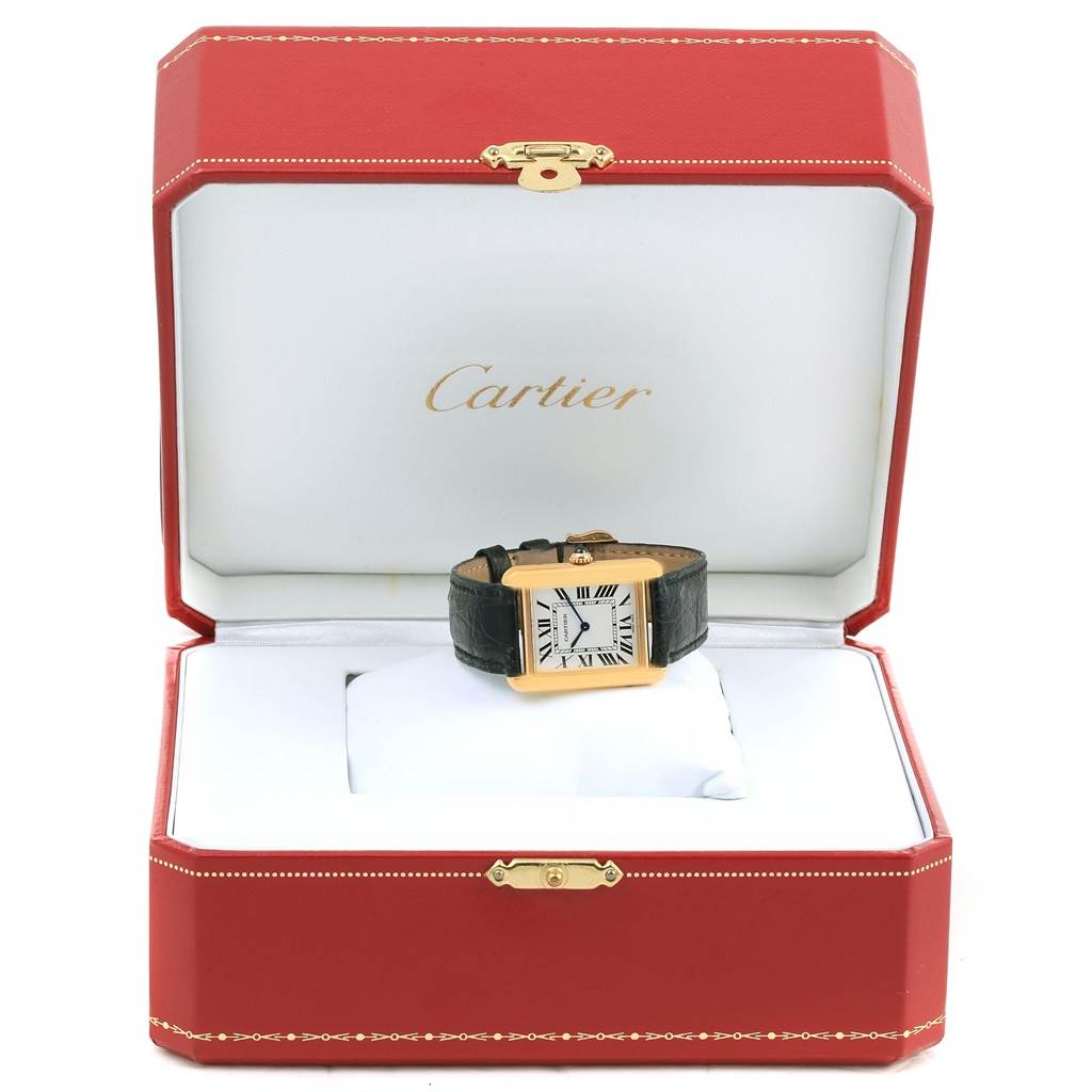 The image shows a Cartier Tank Solo W1018755 Women's Steel and Gold (two tone) Silver Dial W1018755 Women's Steel and Gold (two tone) Silver Dial watch displayed inside its red box, with the face, strap, and parts of the box prominently visible.