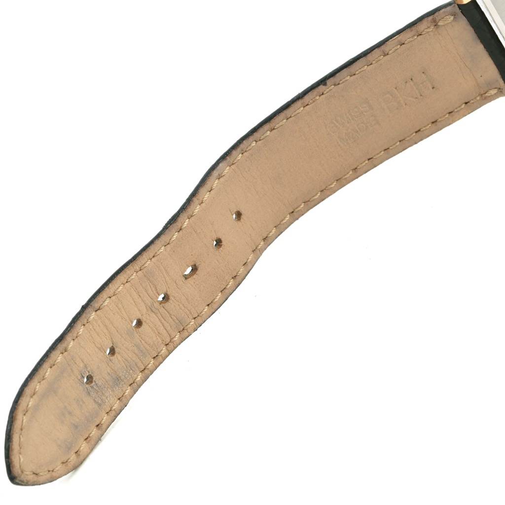 The image shows a close-up of the leather strap for a Cartier Tank Solo W1018755 Women's Steel and Gold (two tone) Silver Dial W1018755 Women's Steel and Gold (two tone) Silver Dial watch, focusing on the details and stitching.