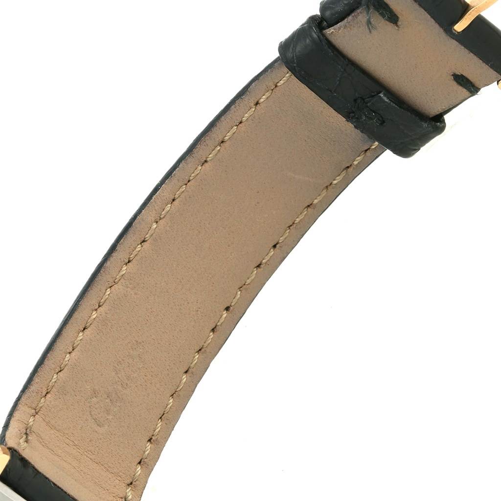 The image shows the underside of the leather strap of a Cartier Tank Solo W1018755 Women's Steel and Gold (two tone) Silver Dial W1018755 Women's Steel and Gold (two tone) Silver Dial watch.