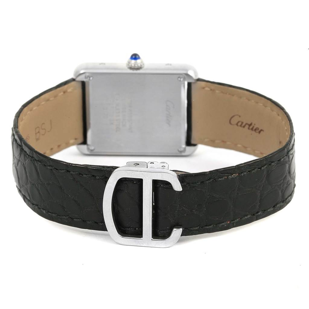 The image shows the rear view of a Cartier Tank Solo W1018255 Women
s Stainless Steel Silver Dial W1018255 Women
s Stainless Steel Silver Dial watch, highlighting the back case and black leather strap with a buckle clasp.