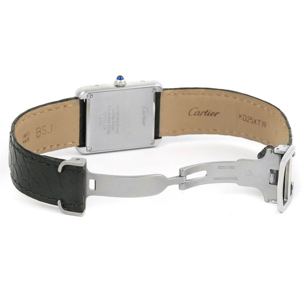 The image shows the back view of a Cartier Tank Solo W1018255 Women
s Stainless Steel Silver Dial W1018255 Women
s Stainless Steel Silver Dial watch, including the case back, leather strap, and deployment clasp.