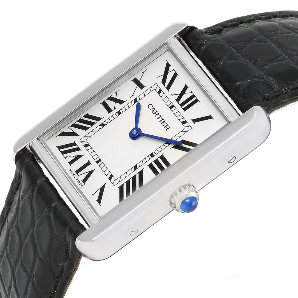 The image shows a Cartier Tank Solo W1018255 Women
s Stainless Steel Silver Dial W1018255 Women
s Stainless Steel Silver Dial watch at a slight angle, highlighting its rectangular face, Roman numeral dial, and black leather strap.